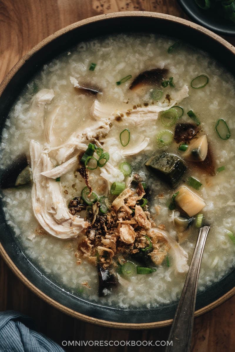Homemade century egg congee with chicken close-up