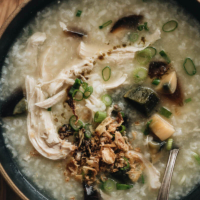 Century Egg Congee with Chicken - Silky creamy congee with shredded chicken cooked in one pot. This recipe requires minimal prep and includes both an Instant Pot version and a stovetop version. {Gluten-Free adaptable} #chinese #comfortfood