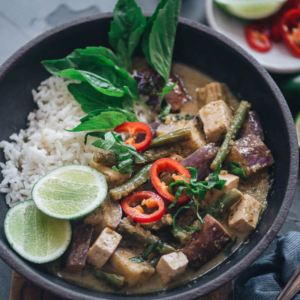Vegan Thai Green Curry - A scrumptious, rich and creamy vegan Thai green curry made easy with fresh aromatics and colorful veggies. Top it on steamed rice and you’ll have a healthy, nutritious one-bowl meal that’s bursting with flavor. {Vegan, Gluten-Free}