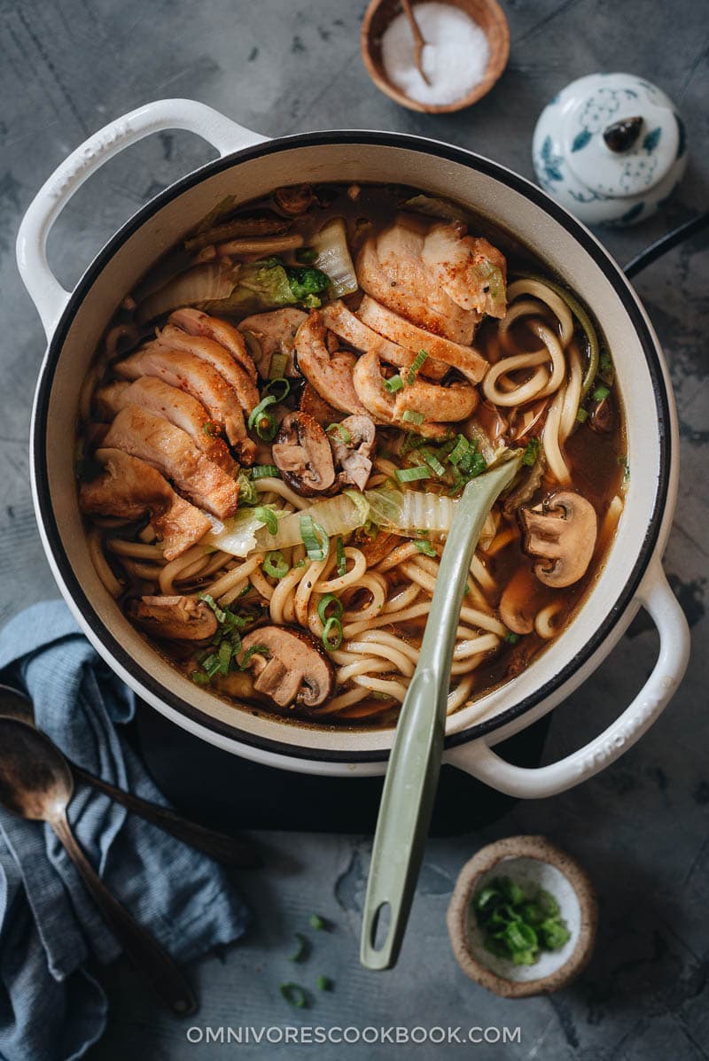 Chicken udon soup in a pot