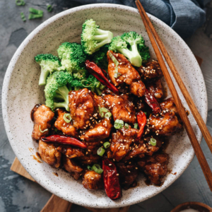 General Tso’s Chicken - An easy General Tso's chicken recipe that yields crispy chicken without deep-frying, served with a sticky, tangy, and sweet sauce. It also uses much less sugar while maintaining a great bold taste. Once you’ve tried it, you’ll skip takeout next time because it’s so easy to make in your own kitchen. {Gluten-Free Adaptable}