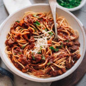 Instant Pot Bolognese (Hong Kong Style) - Pressure cooker bolognese sauce with a hint of sweetness and a super creamy texture without any heavy cream. This easy recipe uses some Asian ingredients to reduce prep and cooking time and create a rich flavor. Perfect for a weekday dinner or meal-prep. {Gluten-Free adaptable}