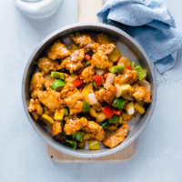 Restaurant-style crispy juicy sweet and sour chicken without deep frying or a wok! {Gluten Free Adaptable}