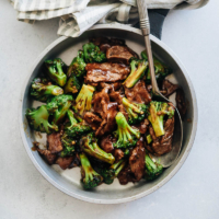 Chinese Beef and Broccoli (One-Pan Take-Out) - This takeout-style Chinese beef and broccoli dish is extra saucy and quick to prepare. The recipe does not require a wok and you can still get that authentic taste.