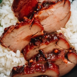 Char siu pork served on steamed rice close-up