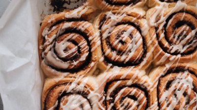 Cinnamon rolls in a pan with glaze