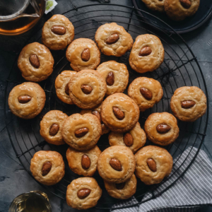 Chinese Almond Cookies | These cookies are not your traditional almond cookies. They have a fluffier and cakier texture, browned edges that are light and crispy, with a slightly chewy, sticky, and soft interior. They have a well-balanced buttery sweetness and nutty taste. They are easy to make and perfect for Chinese New Year and holiday gifting.