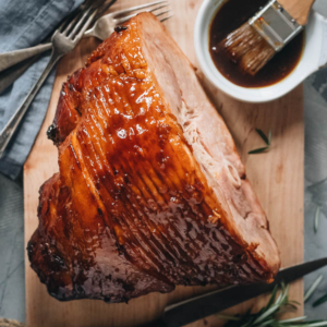 Asian Pineapple Glazed Ham | Try out this easy pineapple glazed ham if you want to make a traditional glazed ham with something new, while staying just as hearty and comforting. The glaze is made from brown sugar and pineapple juice, with a hint of gingery and garlicky taste, just like sweet chili sauce. It is a perfect centerpiece dish for holidays such as Christmas and Easter. {Gluten-Free Adaptable}