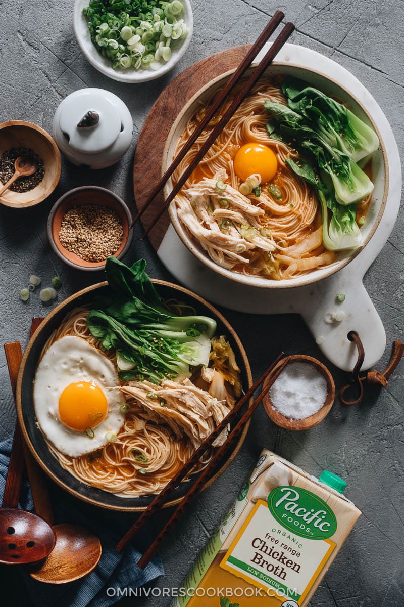 Korean noodle soup topped with egg and baby bok choy