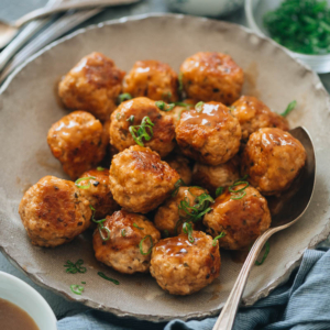 This easy Chinese-style Instant Pot meatball recipe is perfect for your weekday dinners and meal-prep. It creates juicy, tender chicken meatballs and a rich, fragrant gravy in one pot. Top them on rice or noodles - you won't be able to stop eating! {Gluten-Free adaptable}