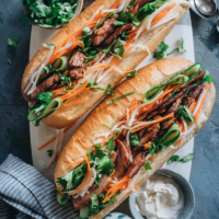 Turn your leftover Easter ham into a Vietnamese favorite with this fast, flavorful ham banh mi sandwich you’ll want for lunch every day! A quick pickle recipe is included so you can recreate that authentic taste in your own kitchen.