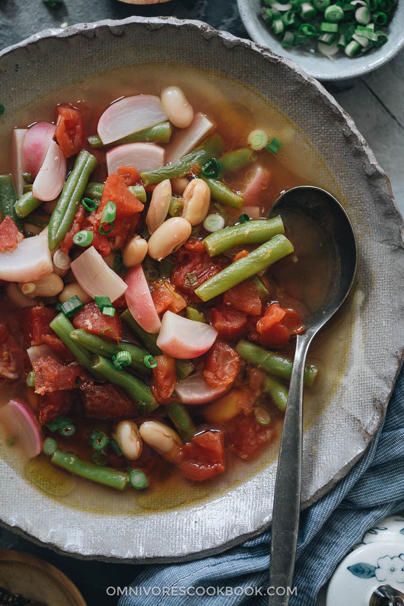 Vegetable soup with radish, green beans, and white beans
