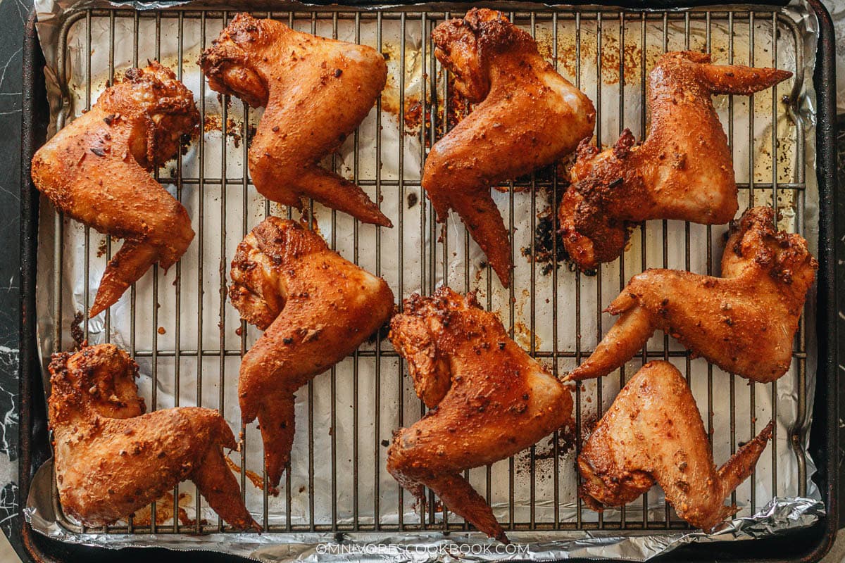 Baked hot wings on a baking sheet