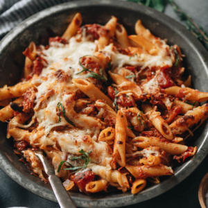 This savory Arrabiata pasta uses pantry staples to give a classic Italian dish a hint of Asian fusion. One pot is all you need for a rich, saucy dinner experience that can easily be tailored to a vegan lifestyle! {Vegetarian, Vegan-Adaptable}