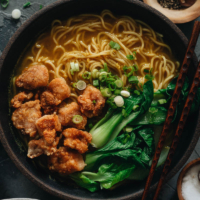 Surprise your taste buds with the textural and flavorful delights of my curry noodle soup. It’s full of fragrance and topped with perfectly crispy bites of popcorn chicken and leafy green bok choy for balance!