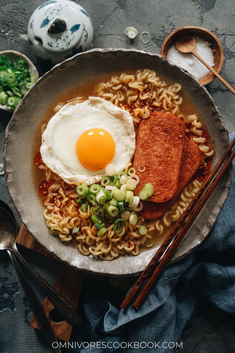 Instant noodles topped with fried spam and eggs