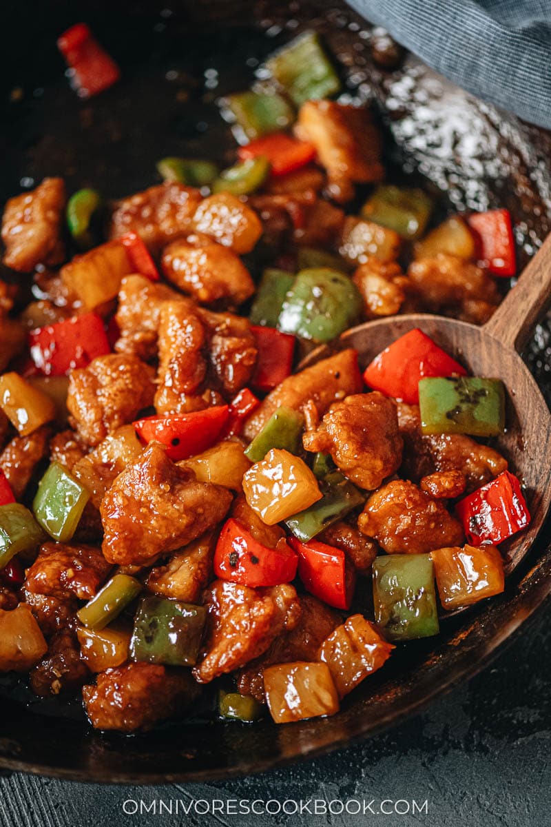 Pineapple chicken with peppers close-up
