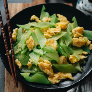 Delicate and delicious celtuce stir fry with eggs is an authentic Chinese homestyle dish that gives you a unique balance of texture and taste that you won’t want to miss! {Gluten-Free, Vegetarian}