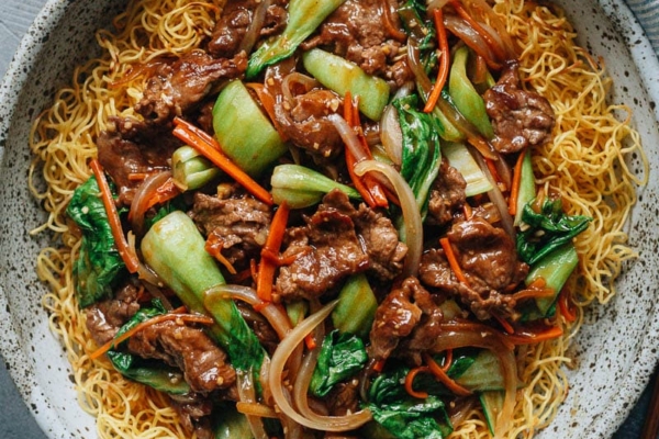 Hong Kong style beef and brown sauce over crispy noodles