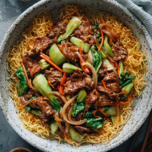 Turn your kitchen into a Chinese restaurant by making crispy pan fried noodles with juicy beef in a rich and savory sauce that tastes too good to be true!