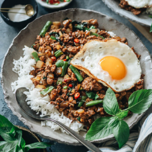 Pad krapow gai with green beans and sunny egg