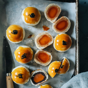 Try something new for the Mid-Autumn Festival with the puff pastry mooncake known as Dan Huang Su, featuring flaky layers of pastry crust stuffed with a sweet filling and salted duck egg yolk.