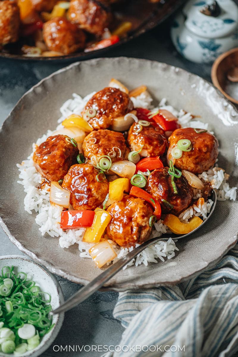 Sweet and sour sauce meatballs over rice