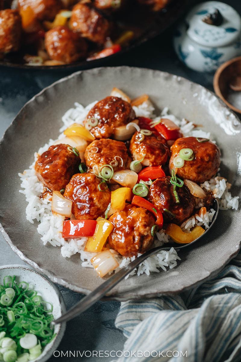Sweet and sour sauce meatballs over rice