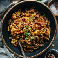 Dig into a bowl of XO fried rice with a crispy, crunchy texture and savory sweet, lightly seafoody taste that transforms your leftover char siu pork into a meal in minutes!