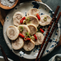Drunken chicken is a traditional Chinese cold appetizer with a juicy texture, an aromatic taste, and just a touch of booze. Make it in advance and serve it with beer - it’s perfect for snacking and dinner parties.