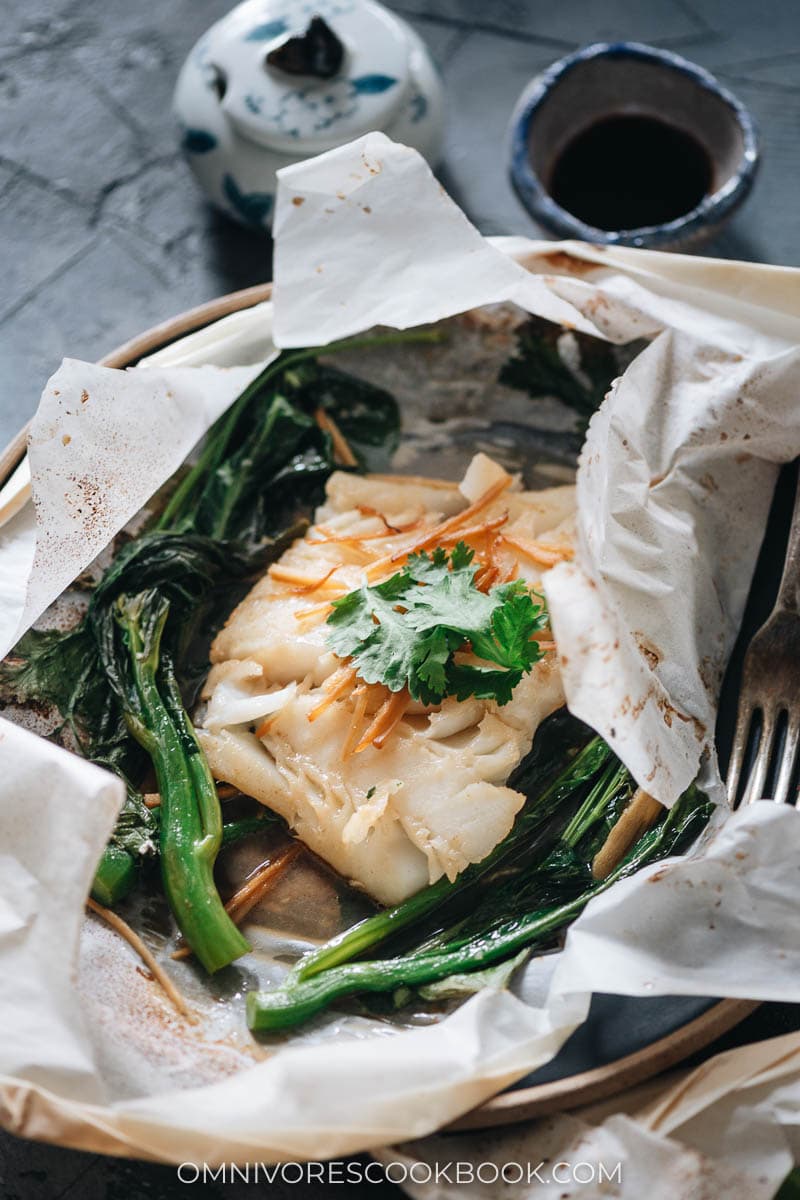 Cod baked in parchment paper with a Chinese sauce