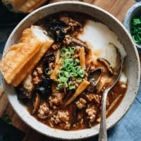 Sharing a street-style recipe for dou fu nao, a classic breakfast in Beijing. The extra soft tofu pudding is served with a brown gravy, made with pork, dried lily flowers and mushrooms, for a satisfying savory and earthy umami. Serve it with you tiao (Chinese fried donut) and you’ll have a hearty Northern-style Chinese breakfast that will warm your soul.