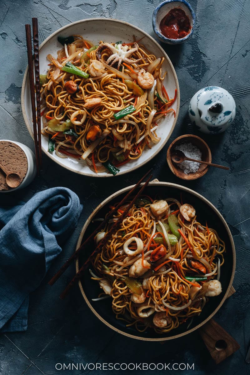 Seafood chow mein served on plates