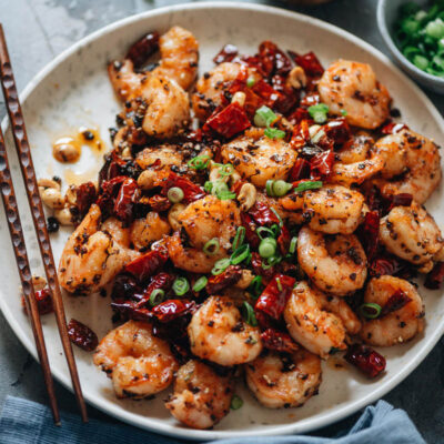 Stir fried shrimp accented with bright pop of Sichuan flavor: chile pepper, tingly peppercorn, and a dose of umami will just dazzle your taste buds.