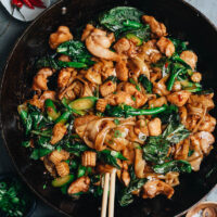 Savory brown sauce bejeweled with colorful veggies, chicken, and rice noodles make these drunken noodles (Pad Kee Mao) a fantastic 15-minute meal you can whip up any time!
