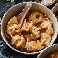 Vegan Wonton Soup is a restaurant-quality treat that celebrates the bright flavors and diverse textures of a number of different veggies. The homemade broth is rich with umami and deeply comforting. The wontons and soup combine for a bowl of hot nourishment that is hard to beat.