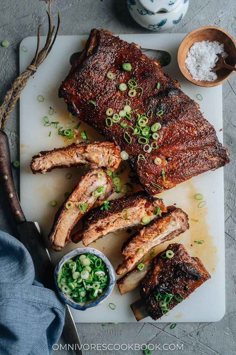 A slab of juicy Chinese dry rub ribs with a few sliced off