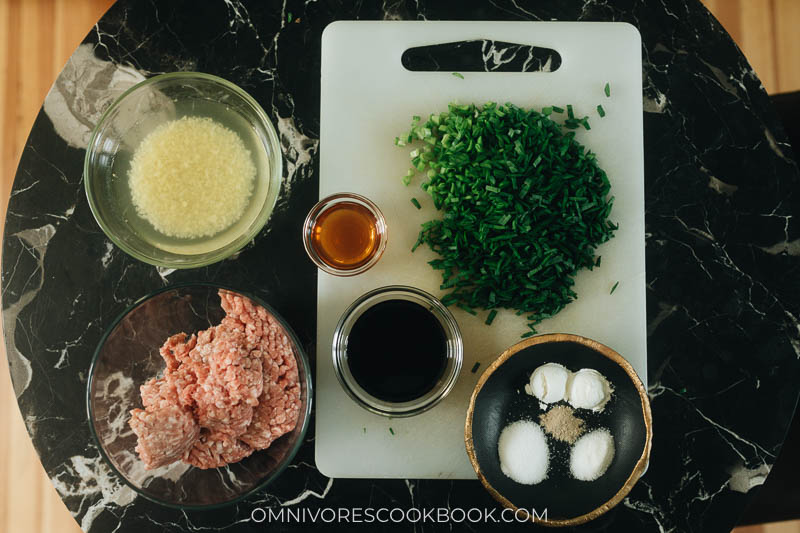Mise-en-place for making pork and chive filling