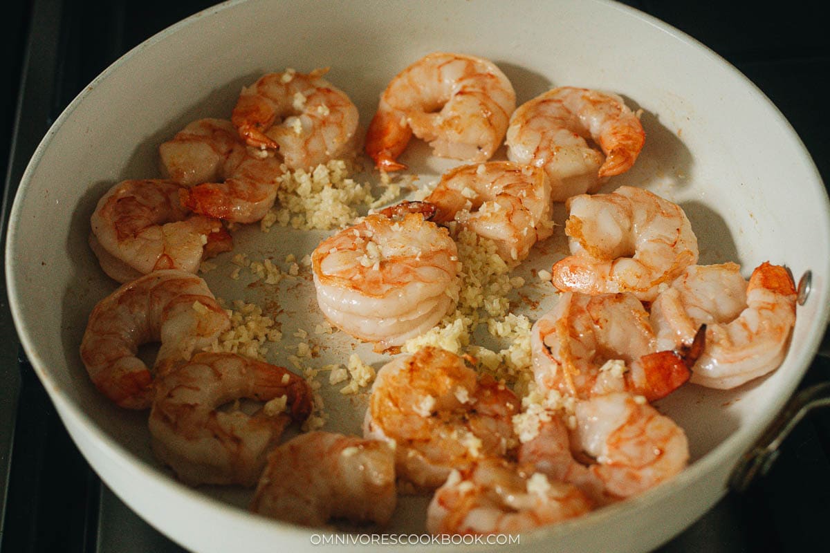 Cook shrimp with aromatics