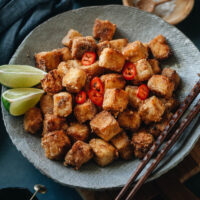 Salt and pepper tofu has a crispy texture and is bursting with spicy, savory flavors that make it a crowd-pleasing appetizer that will surprise and delight everyone at your table. {Vegan, Gluten-Free Adaptable}
