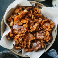 This super easy candied walnuts recipe yields gorgeously coated sugary, crunchy nuts with a Chinese-inspired spice mix to add a spicy savory touch. They are perfect for holiday gifting, topping on your salad, or simply serving as a snack. {Vegan, Gluten-Free}