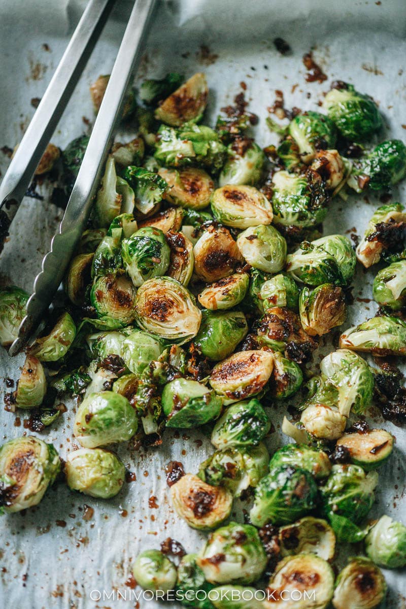 Roasted brussels sprouts coated with a sticky plum sauce