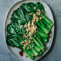 Introducing a super-fast and easy Chinese greens recipe that helps you prepare many types of green leafy vegetables. All you need is four ingredients and 10 minutes to serve a delicious and healthy side dish with your Chinese dinner. {Vegan, Gluten-Free Adaptable}
