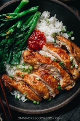 Salt baked chicken over rice with Chinese broccoli