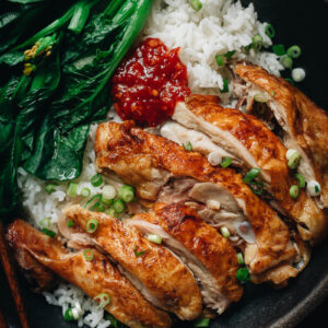 Salt baked chicken over rice with Chinese broccoli