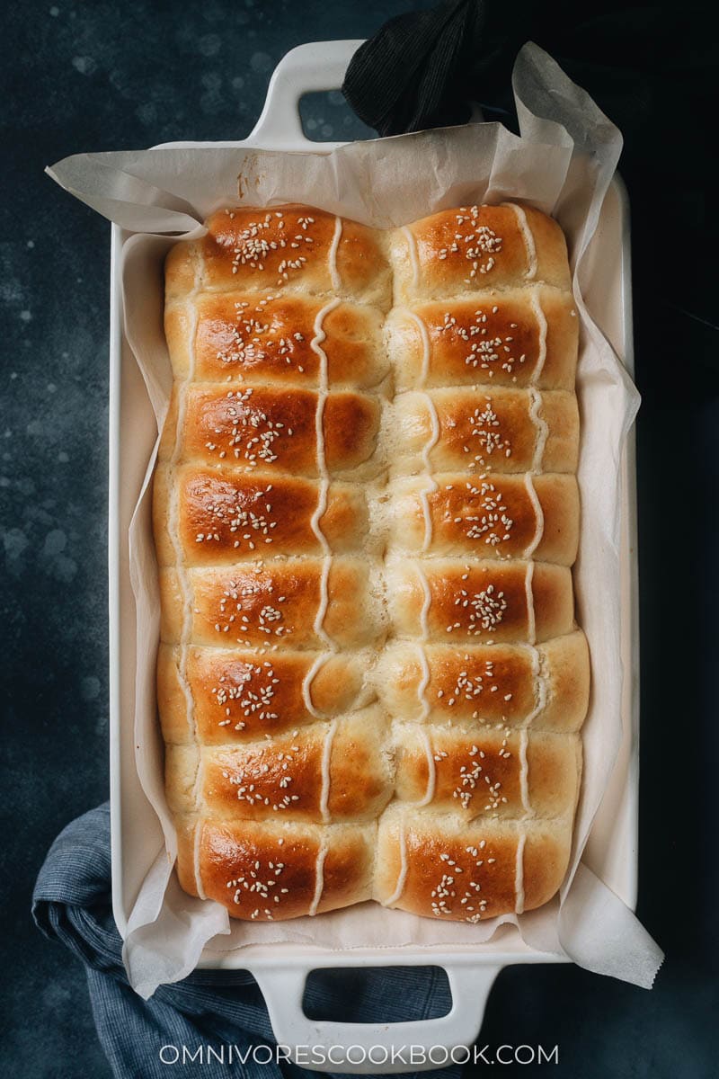 Homemade coconut buns in a casserole dish