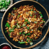 A super fast and easy way to make pork fried rice and get dinner on the table quickly. This fried rice dish is super bold and rich. It hits all the right notes with great flavors and textures and tastes better than takeout. {Gluten-Free adaptable}