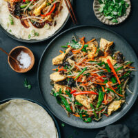 A Northern Chinese style vegetarian moo shu that uses colorful crunchy vegetables and scrambled eggs to create the best texture, served on a thin flour pancake brushed with a savory sweet sauce. It is very easy to put together and extremely satisfying to eat. Serve it as a main course for the best vegetarian dinner! {Vegetarian}