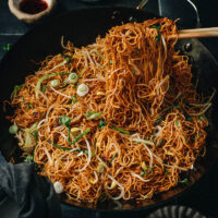 Super fast and easy soy sauce pan fried noodles that you can put together in 10 minutes! The noodles are beautifully charred then mixed with a savory sauce, creating a crispy caramelized effect. Top it with an egg and serve it as a quick main dish, or serve it as a side as part of a full-on Chinese dinner! {Vegetarian}