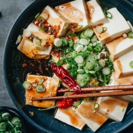 Silky tender tofu is steamed then drizzled with a fragrant aromatic oil and a rich sauce that is savory and sweet. It’s a beautiful hot appetizer that is simple and surprisingly satisfying. Serve it as a light meal with steamed rice or as part of a multi-course dinner. {Vegetarian, Vegan, Gluten-Free Adaptable}